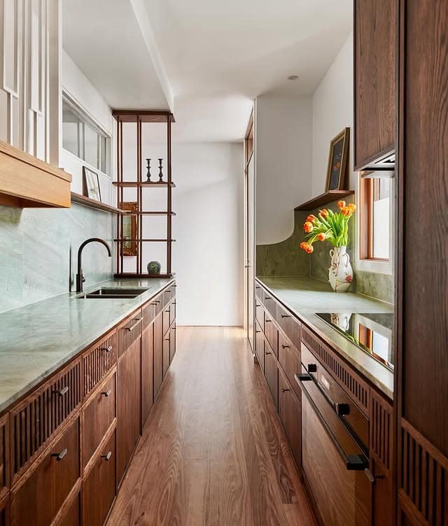 16. Rich Wood Galley Kitchen with Green Stone Counters - galley kitchen ideas