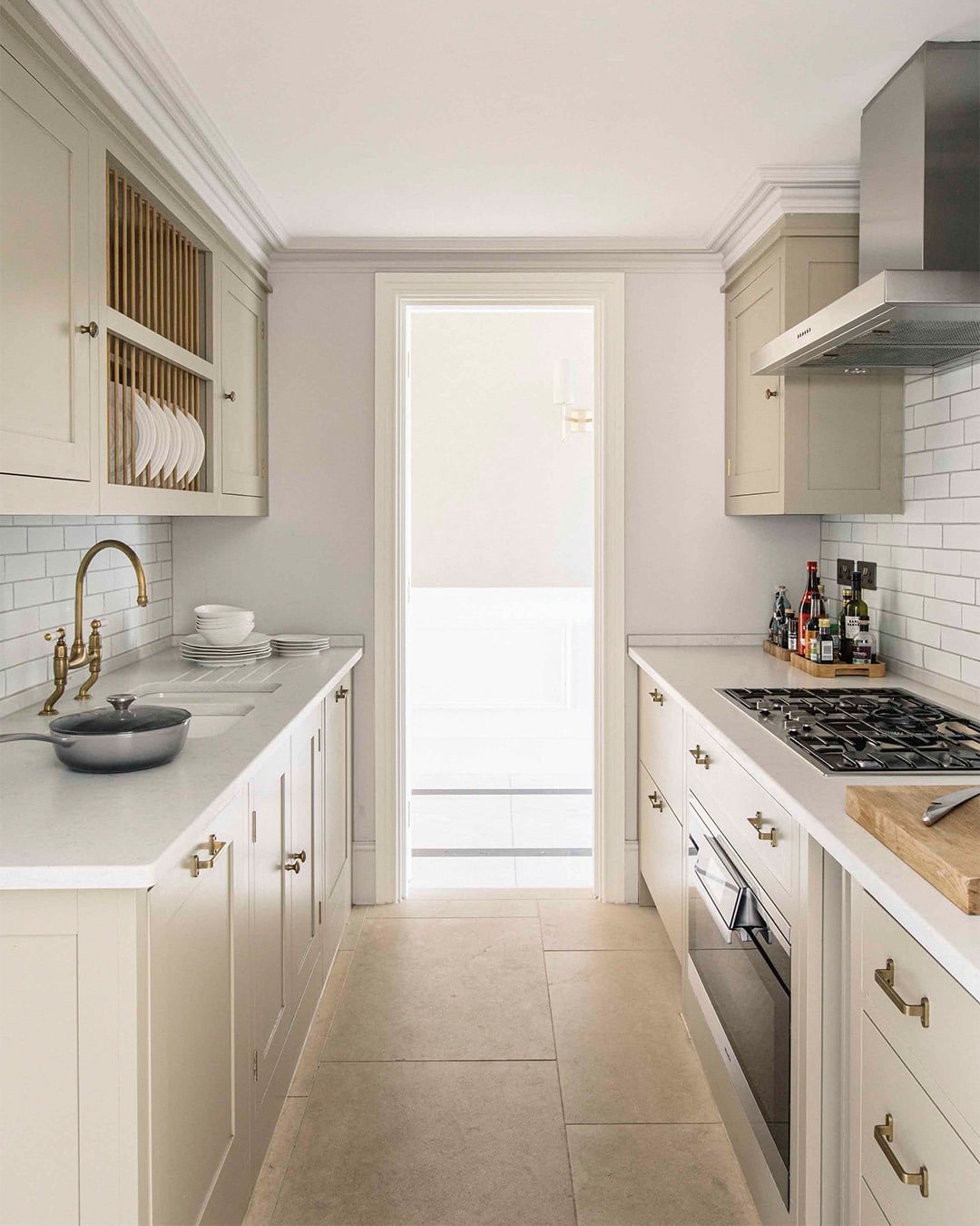 17. Traditional Cream Galley Kitchen with Subway Tile - galley kitchen ideas