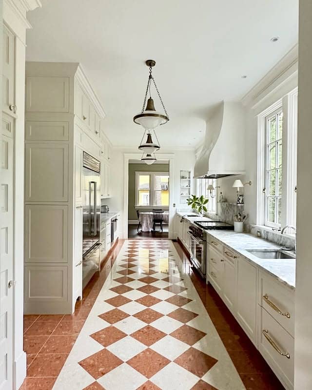 20. Elegant Cream Galley Kitchen with Checkerboard Flooring - galley kitchen ideas