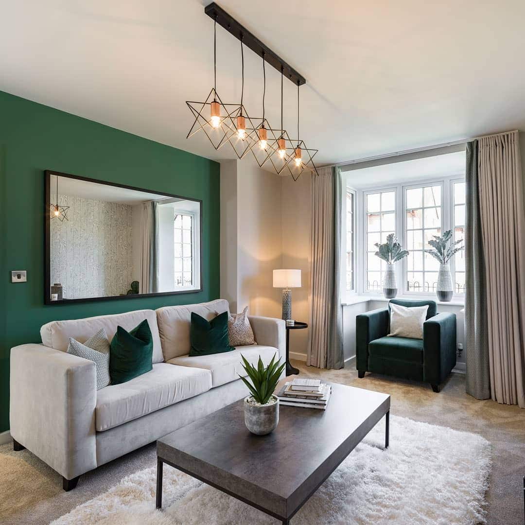 8. Emerald Feature Wall with Soft Neutral Contrast - emerald green living room ideas