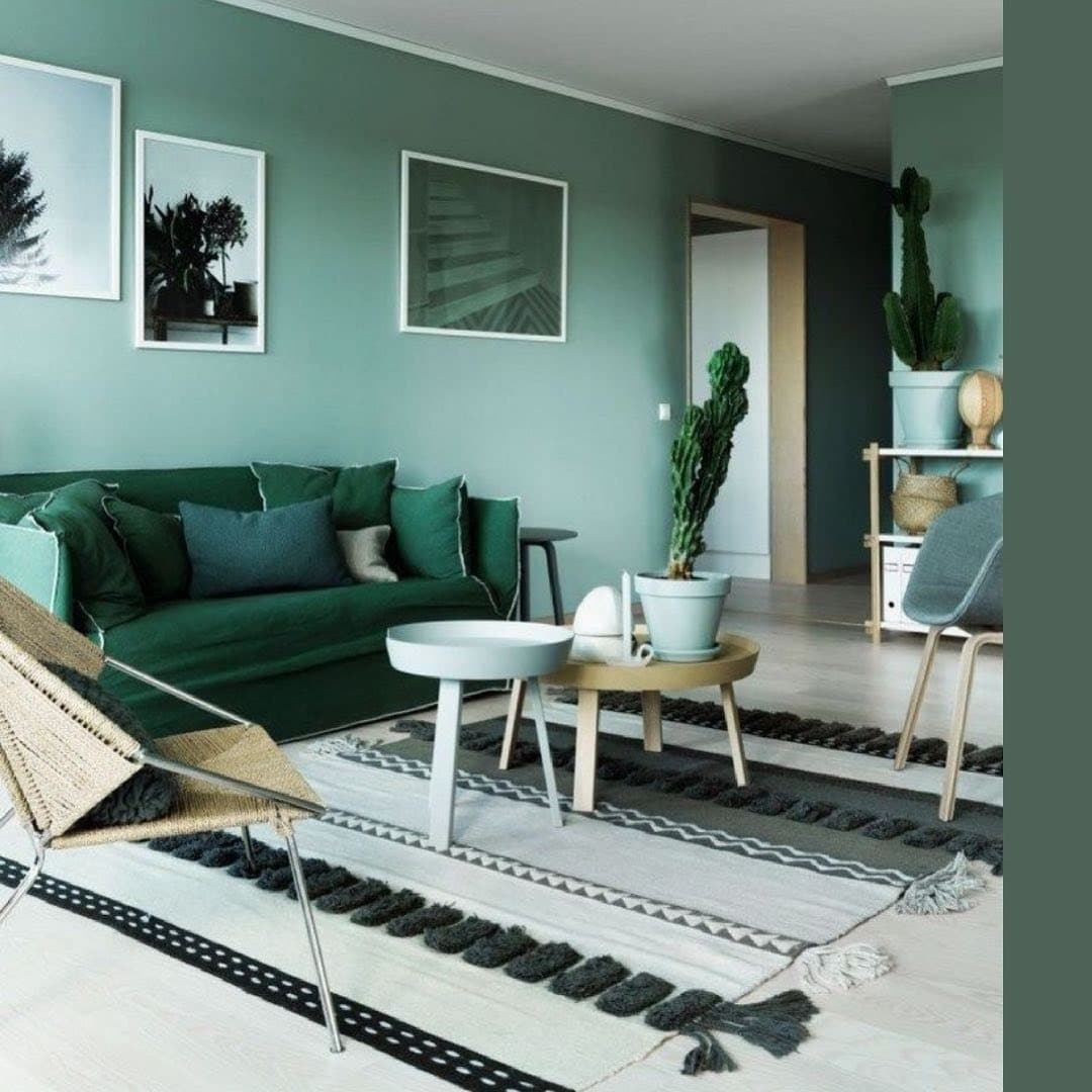 9. Soft Green Living Room with Scandinavian Influence - emerald green living room ideas