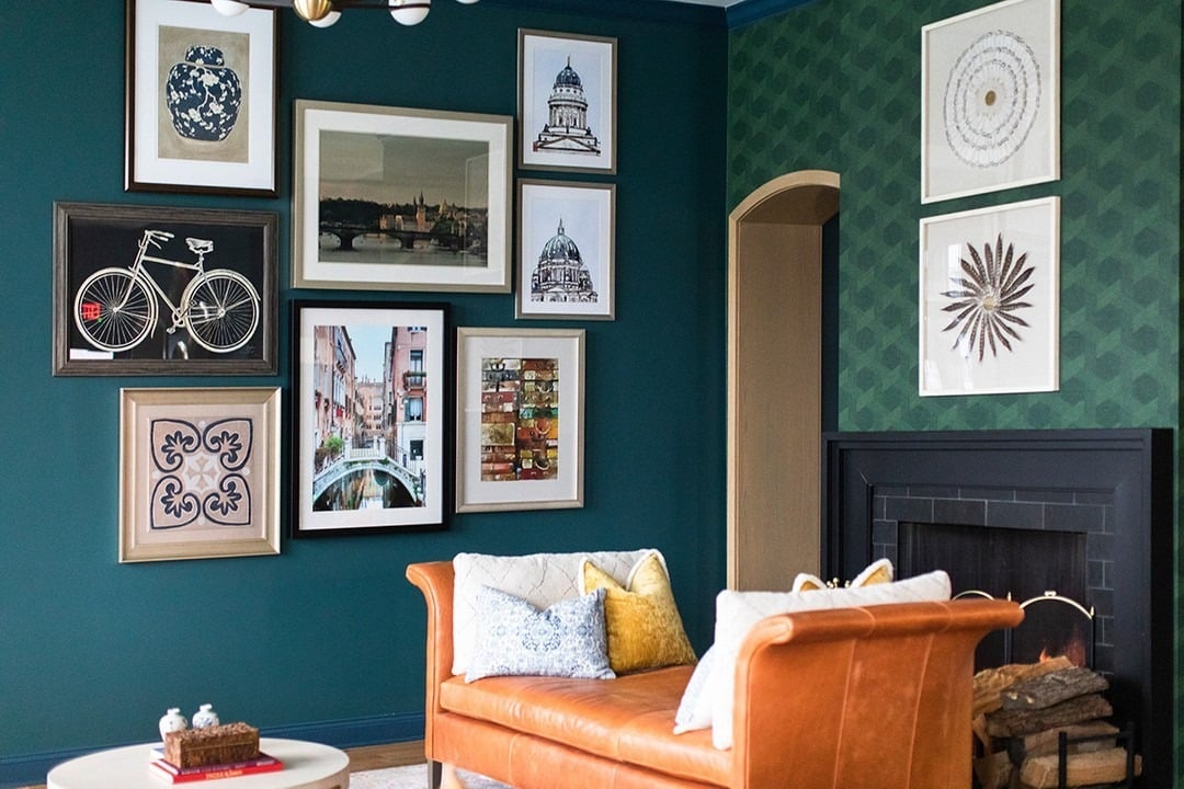 15. Gallery Wall Styling on Emerald Backdrop - emerald green living room ideas