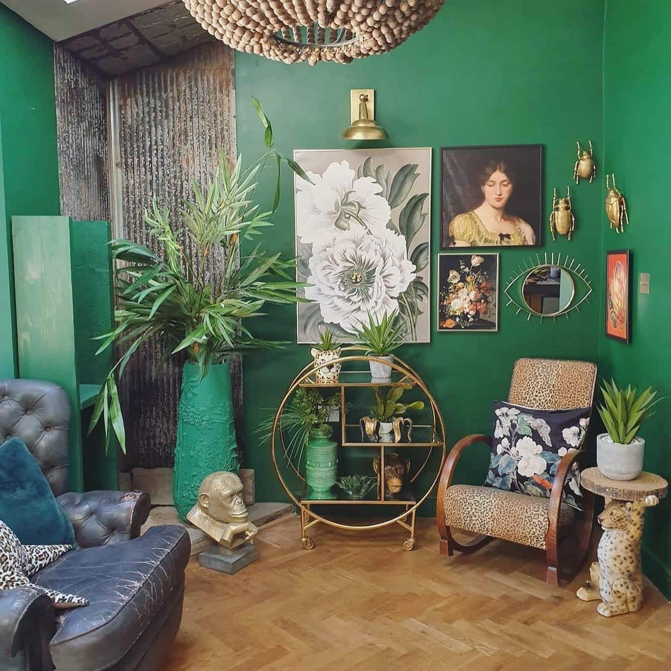 20. Eclectic Emerald Living Room with Mixed Patterns - emerald green living room ideas