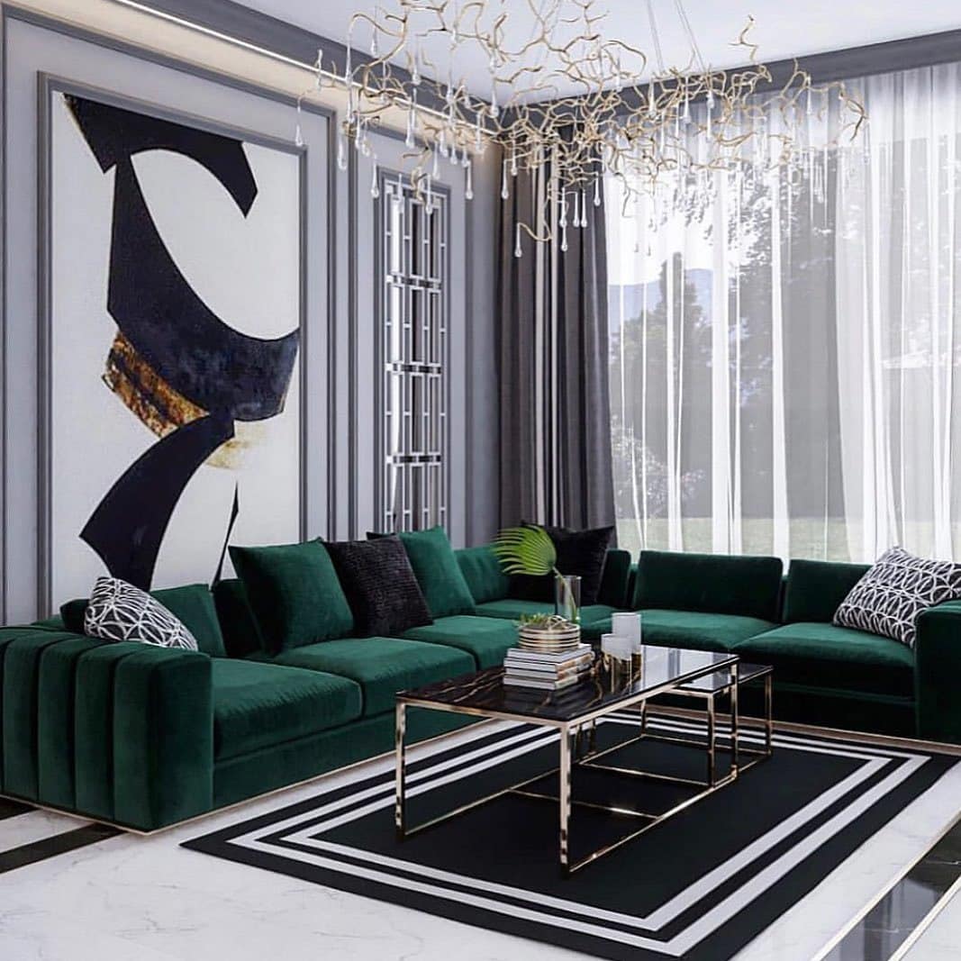 21. Modern Emerald Sectional with Graphic Black and White Accents - emerald green living room ideas