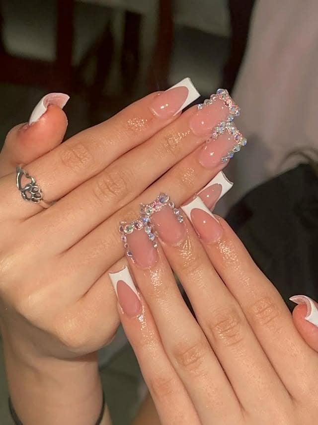 9. French Tips with Rhinestone Frame - french tip nail ideas