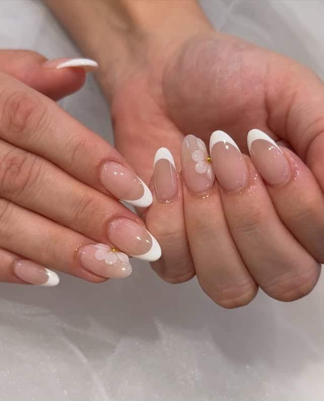 12. Almond Milky Nude French with 3D Flower Detail - french tip nail ideas