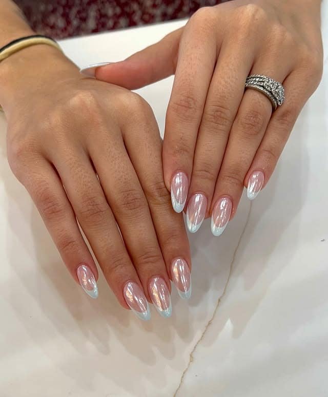 21. Iridescent Chrome Blue French Tip Almond Nails - french tip nail ideas