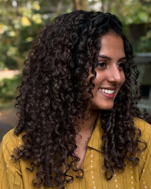 3. Natural Deep Brunette Ringlets - Messy Curly Hair