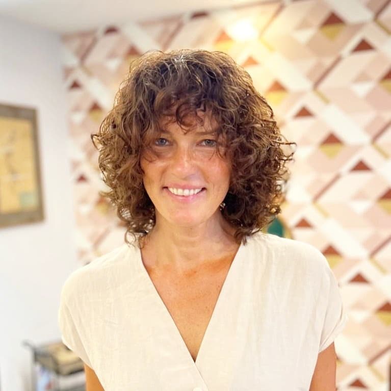 11. Curly Shag with Warm Chestnut Brown - Messy Curly Hair