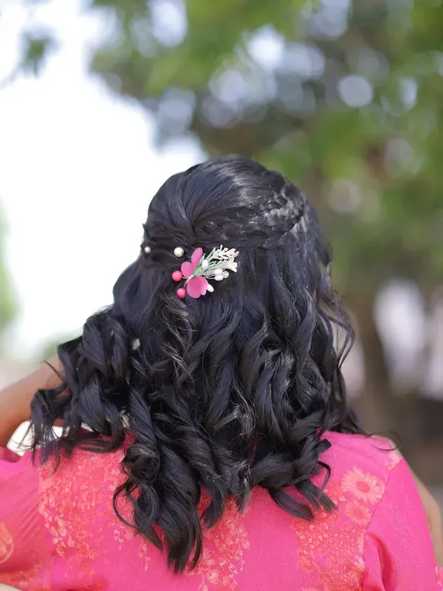 15. Half-Up Curled Style with Deep Black Finish - Messy Curly Hair