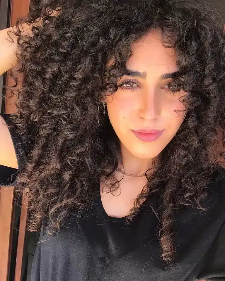 16. Full Volume Dark Brown Tight Curls - Messy Curly Hair