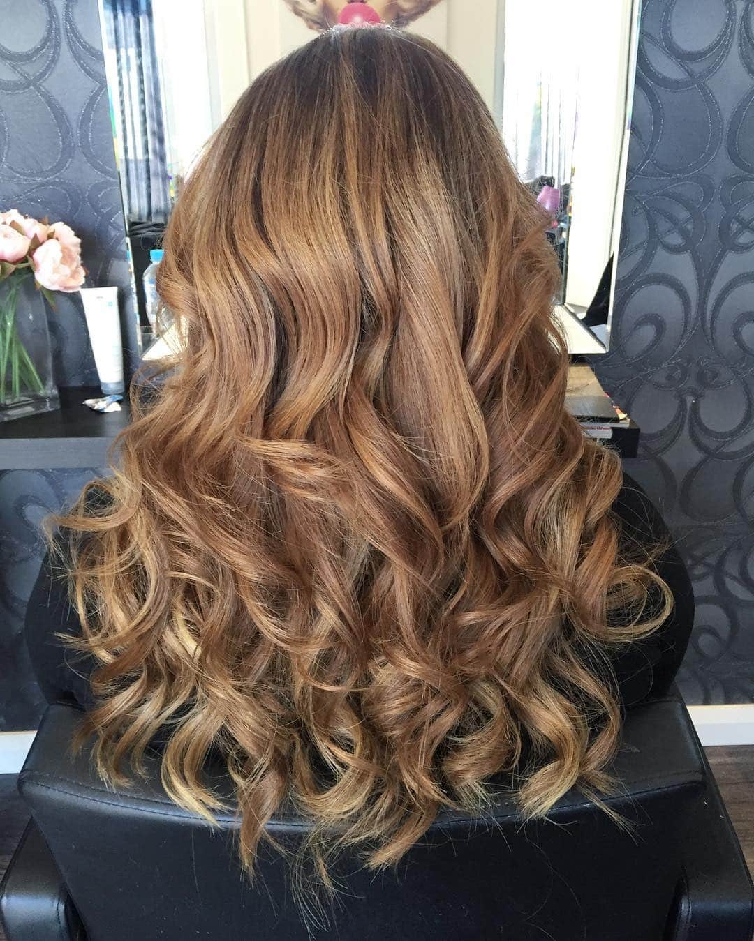 18. Golden Caramel Layered Waves and Curls - Messy Curly Hair