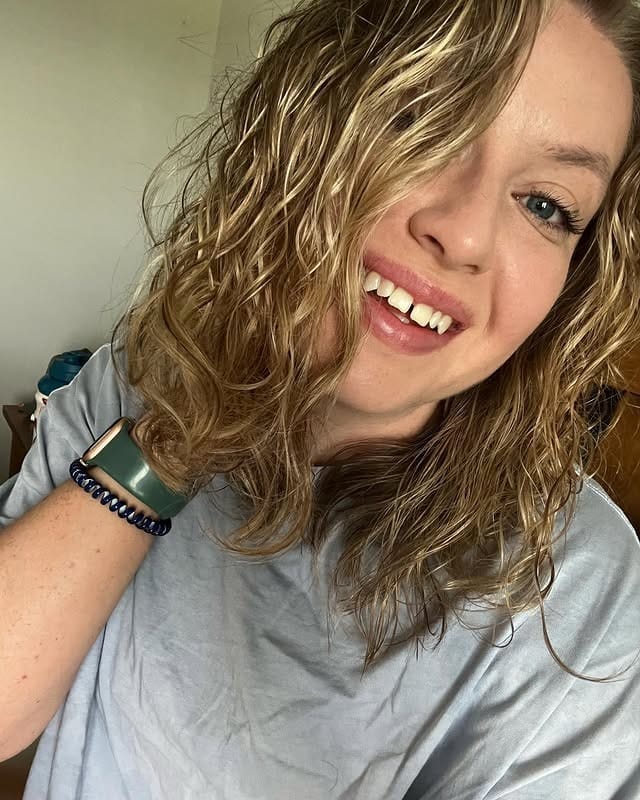 19. Soft Honey Blonde Beachy Curls - Messy Curly Hair
