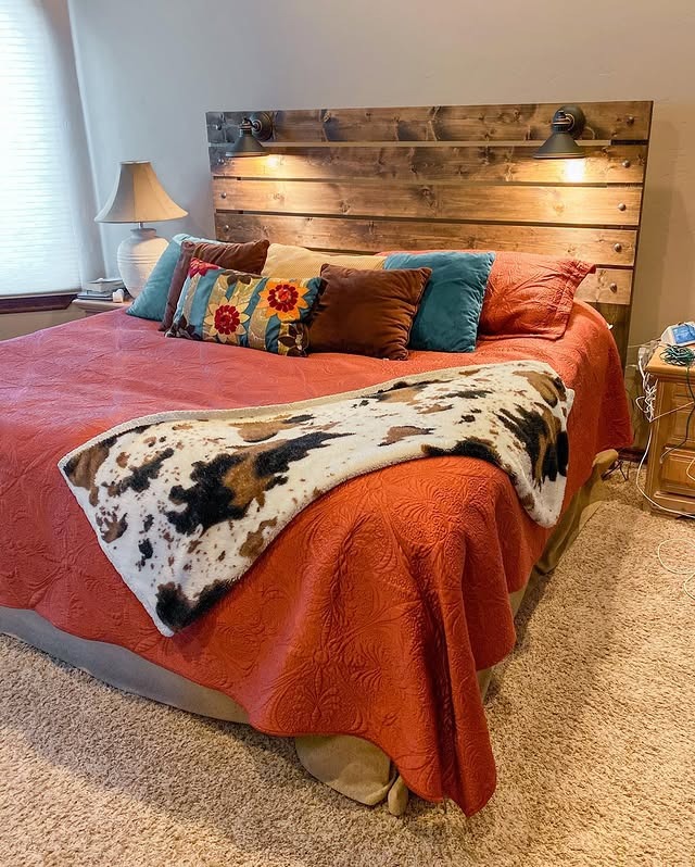 1. Rustic Wood Headboard with Warm Terracotta Accents - rustic bedroom ideas