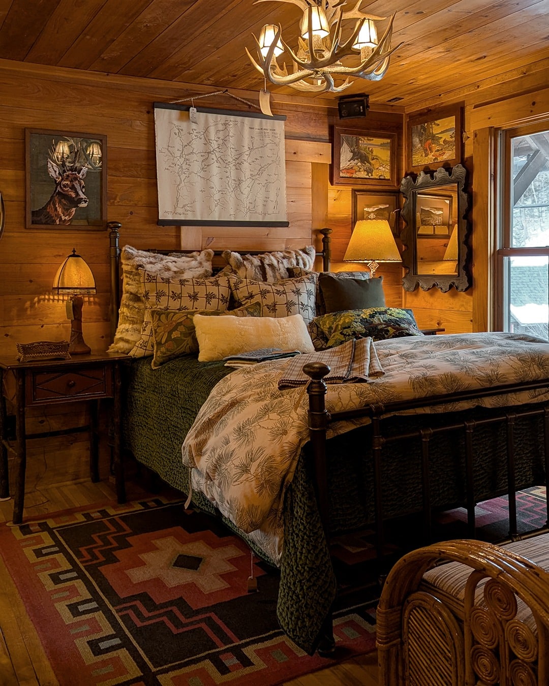 11. Woodland Cabin Bedroom with Amber Wood and Forest Green Layers - rustic bedroom ideas