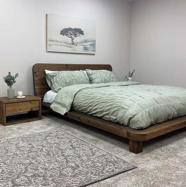 13. Minimal Rustic Platform Bed with Sage Green and Neutral Tones - rustic bedroom ideas