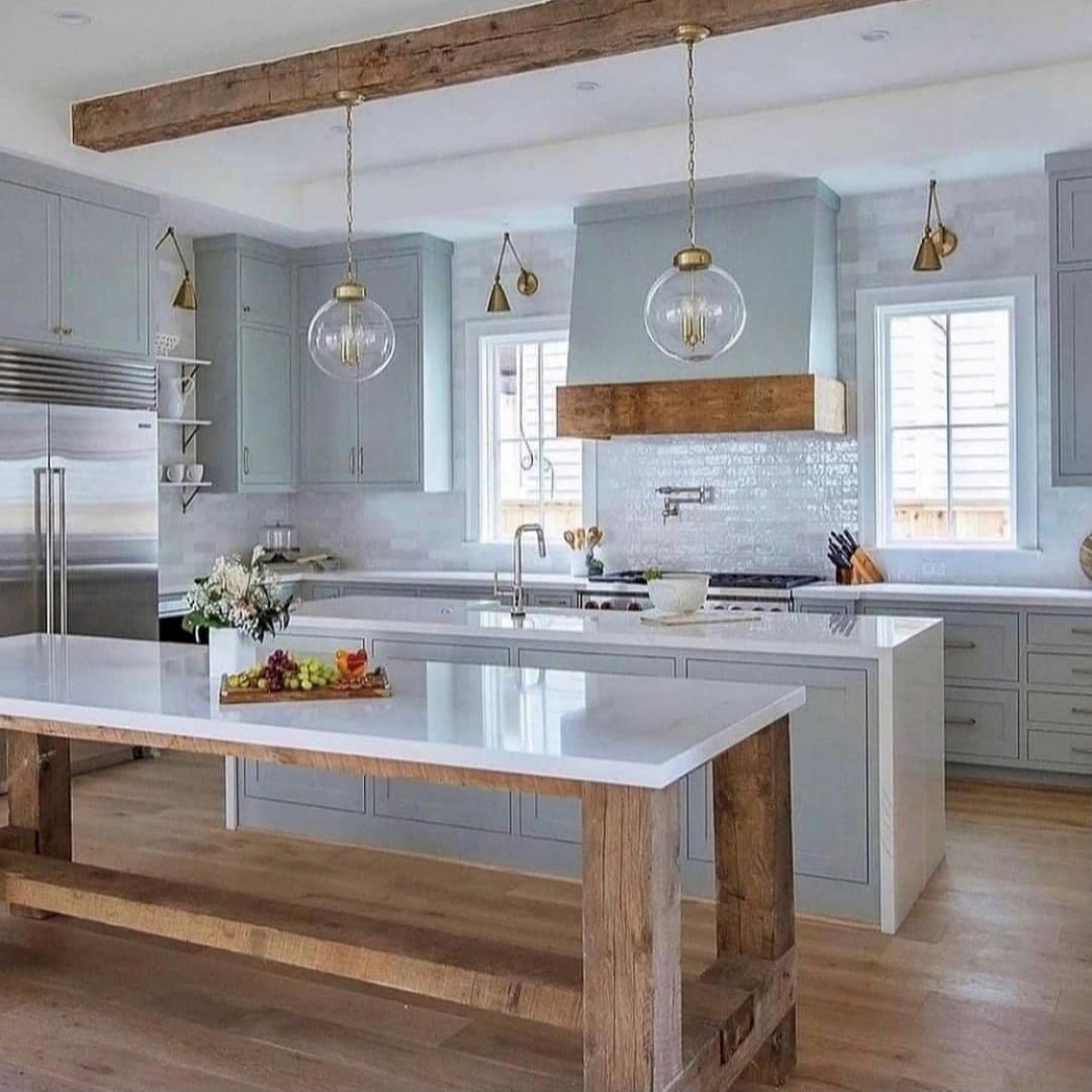 14. Classic Blue-Grey Country Kitchen with Brass Lighting and Wooden Details - country style kitchen ideas