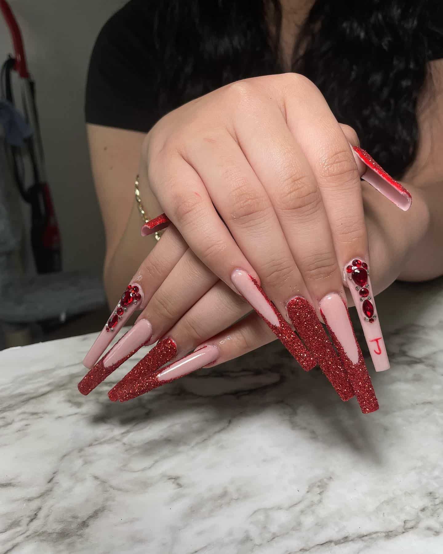 13. Long Red Glitter Coffin Nails with Full Rhinestone Embellishment - red prom nail ideas