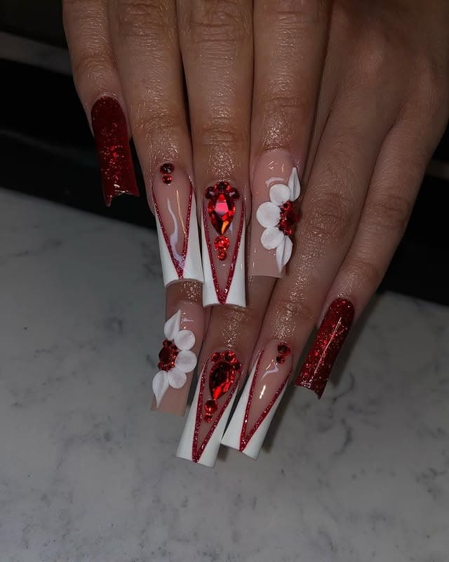 21. Red and White V-Cut Coffin Nails with Rhinestones and 3D Floral Accents - red prom nail ideas