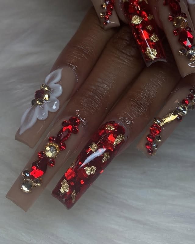 22. Deep Red Encapsulated Coffin Nails with Gold Foil and Crystal Embellishments - red prom nail ideas