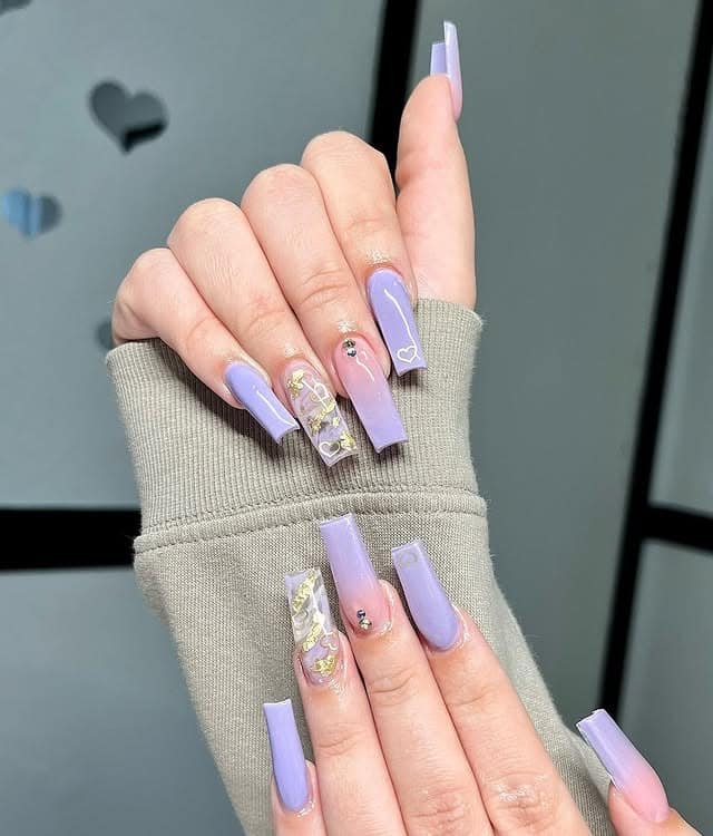 2. Ombre Lavender Coffin Nails with Gold Leaf Detail - purple and lavender nail ideas