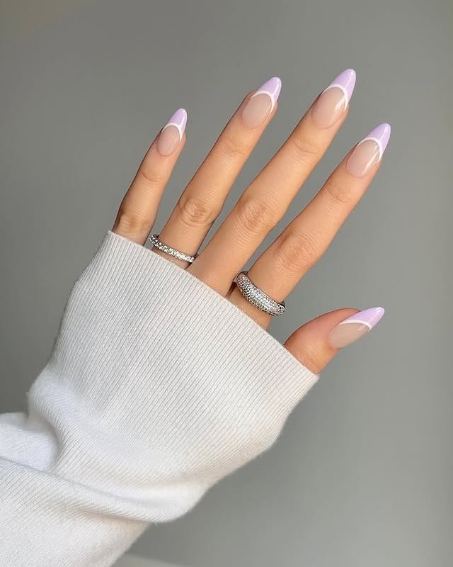 18. Soft Lavender French Tip Almond Nails with Classic Finish - purple and lavender nail ideas