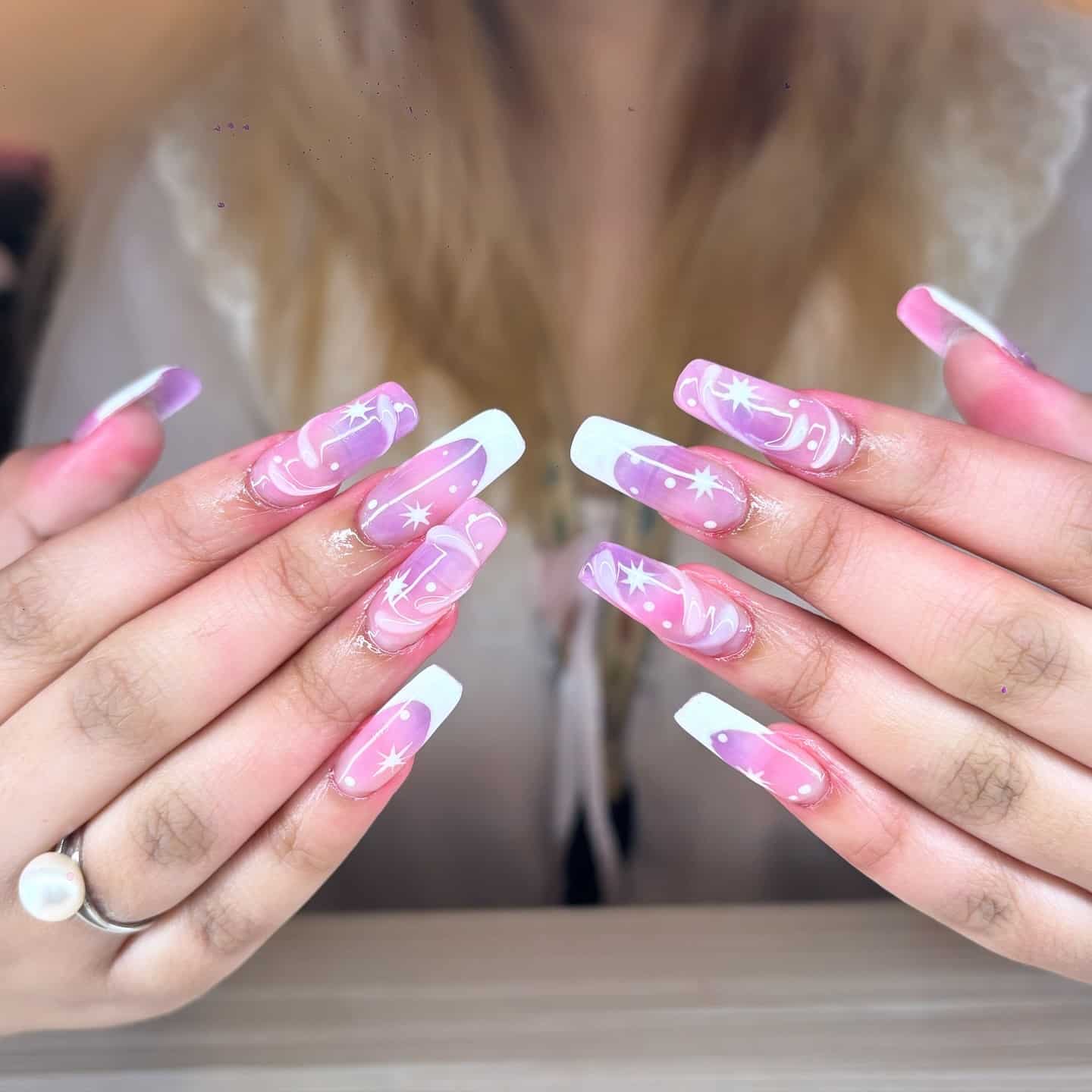 21. Pink and Lavender Swirl Coffin Nails with Celestial Art - purple and lavender nail ideas