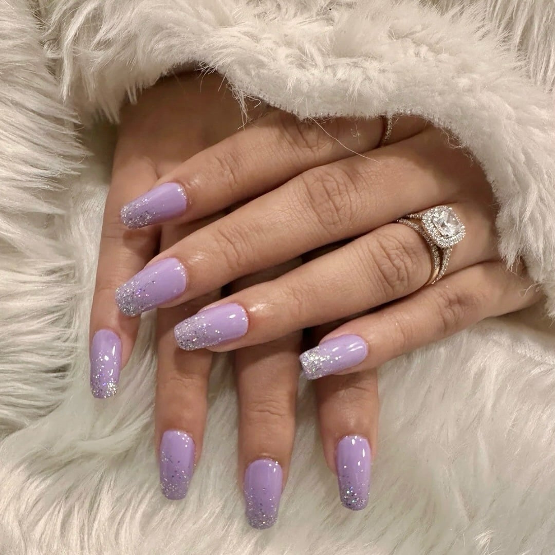 22. Lavender Glitter Fade Square Nails with Soft Sparkle Finish - purple and lavender nail ideas