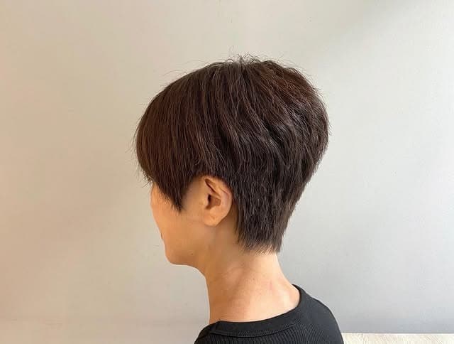 2. Feathered Espresso Pixie Bob - Ear Length Bob