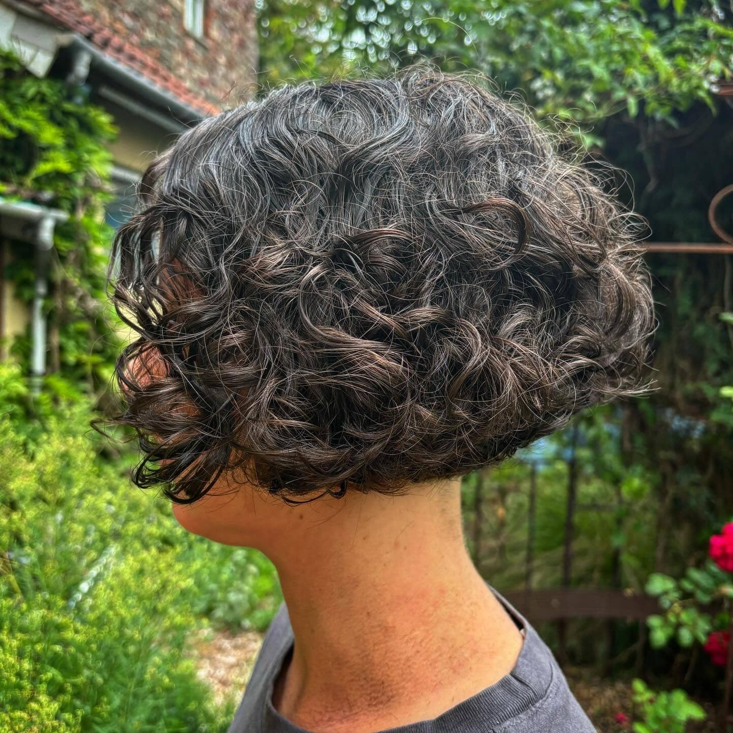 5. Curly Brunette Ear-Length Bob - Ear Length Bob