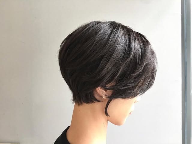 6. Sleek Midnight Brown Graduated Bob - Ear Length Bob