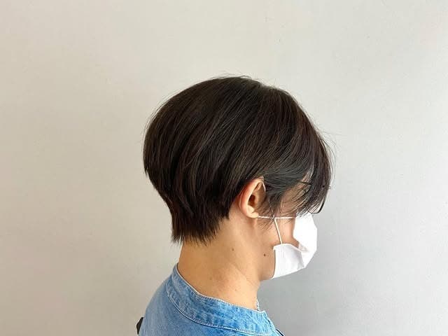 13. Sleek Dark Brunette Tapered Ear-Length Bob - Ear Length Bob