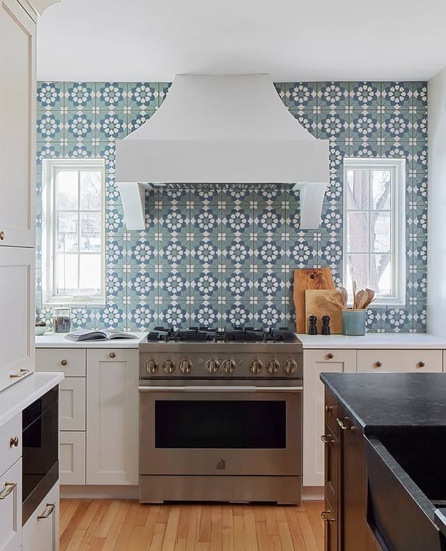 2. Blue Geometric Pattern Tile with White Range Hood Feature - kitchen tile ideas