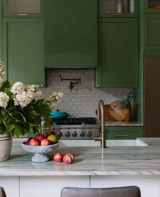 9. Green Cabinetry with Linear Graphic Tile Accent - kitchen tile ideas