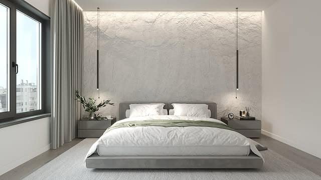 3. Plaster Wall Elegance in Neutral Bedroom - minimalist bedroom ideas