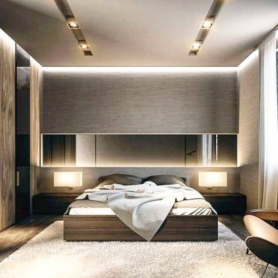 8. Layered Lighting & Wood Panel Contemporary Bedroom - minimalist bedroom ideas