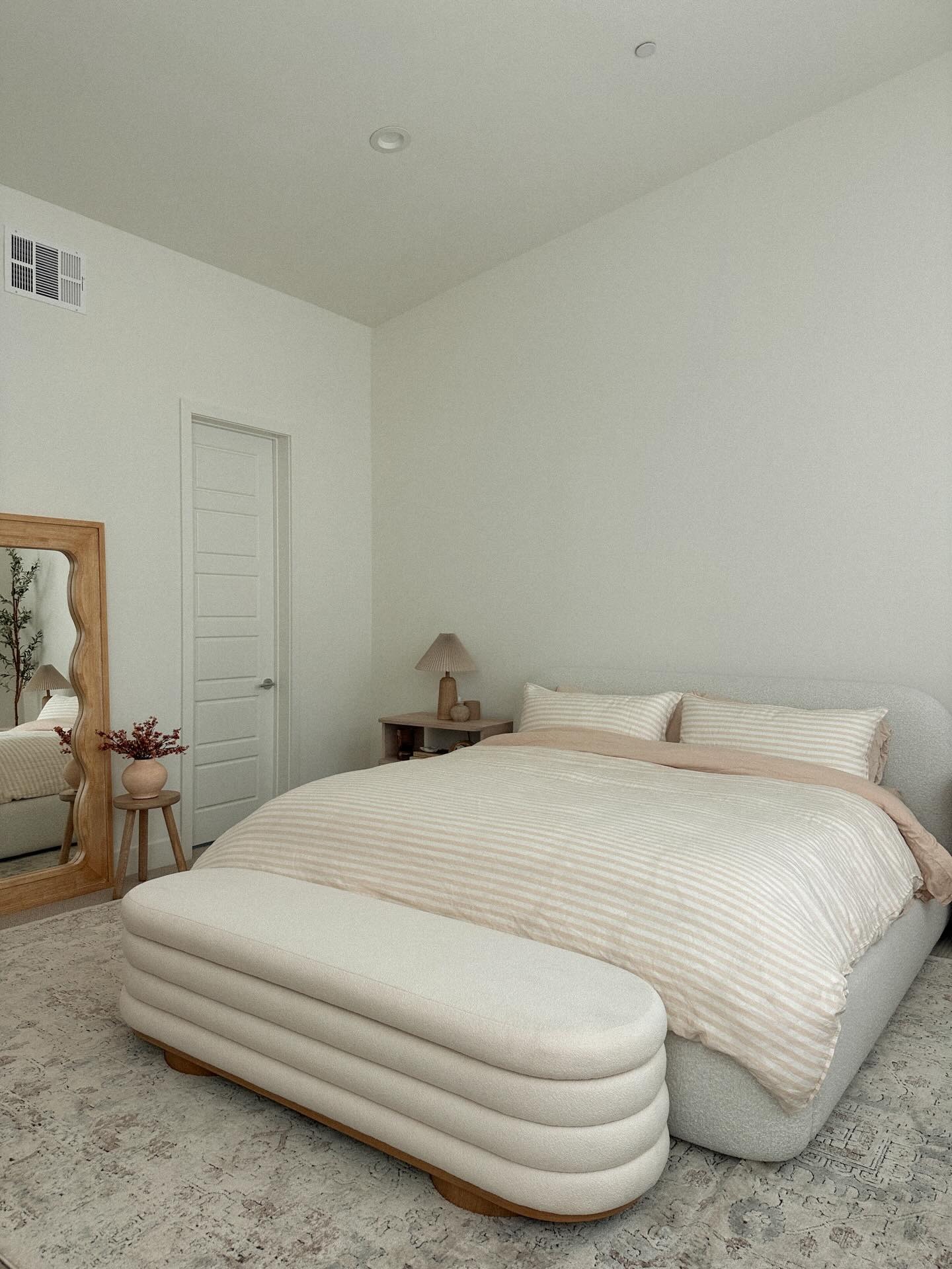 22. Soft Cream Upholstery & Neutral Stripe Bedroom - minimalist bedroom ideas