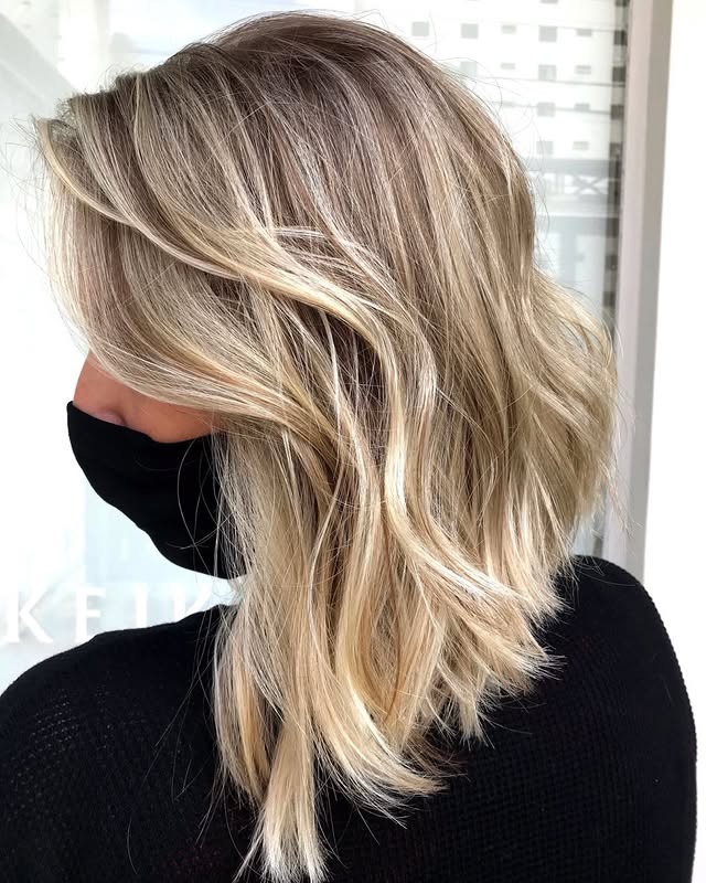1. Soft Layered Blonde Lob with Face-Framing Highlights - Short Messy Hair For Women