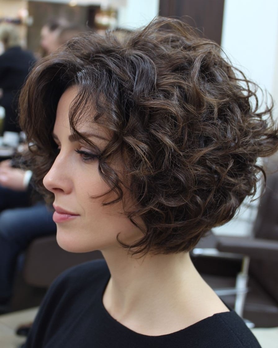 10. Curly Voluminous Bob with Deep Brunette Shine - Short Messy Hair For Women