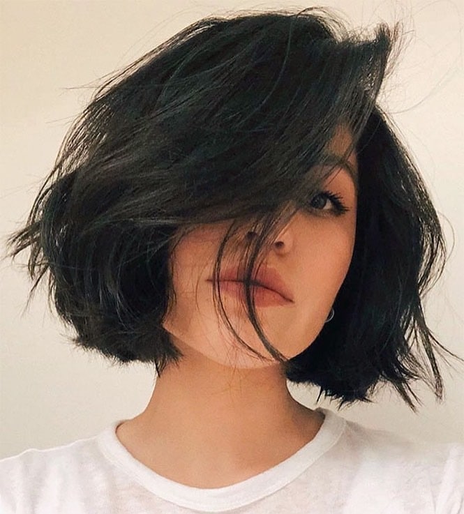 20. Messy Jet Black Bob with Dramatic Side Sweep - Short Messy Hair For Women