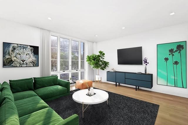 1. Emerald Accent Living Room with Clean White Backdrop - large living room ideas
