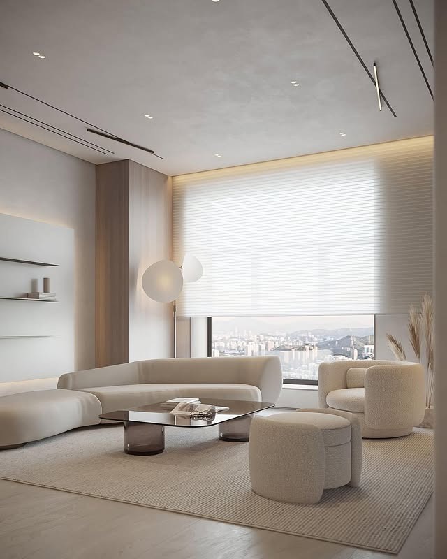 12. Sculpted Minimal Living Room in Soft Beige and Ivory - large living room ideas