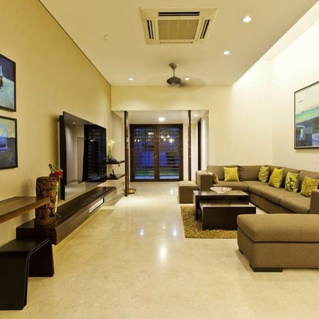 13. Contemporary Living Room with Beige and Olive Accents - large living room ideas