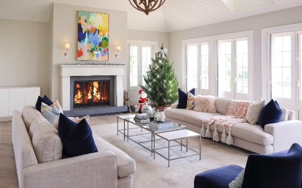 14. Classic Fireplace Living Room with Cream and Navy Contrast - large living room ideas