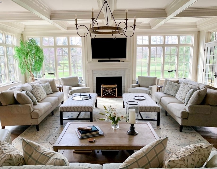 21. Classic Symmetrical Living Room with Soft Beige and Cream Palette - large living room ideas