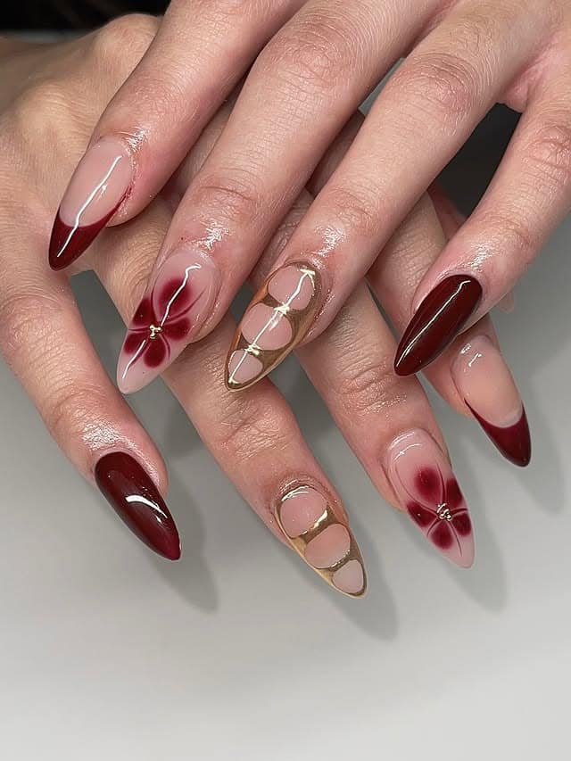 1. Burgundy French Fade with Floral Accent Almond Nails - nail art ideas