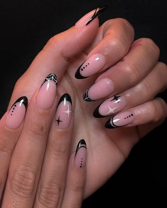 11. Black French Tip Almond Nails with Star and Web Art - nail art ideas