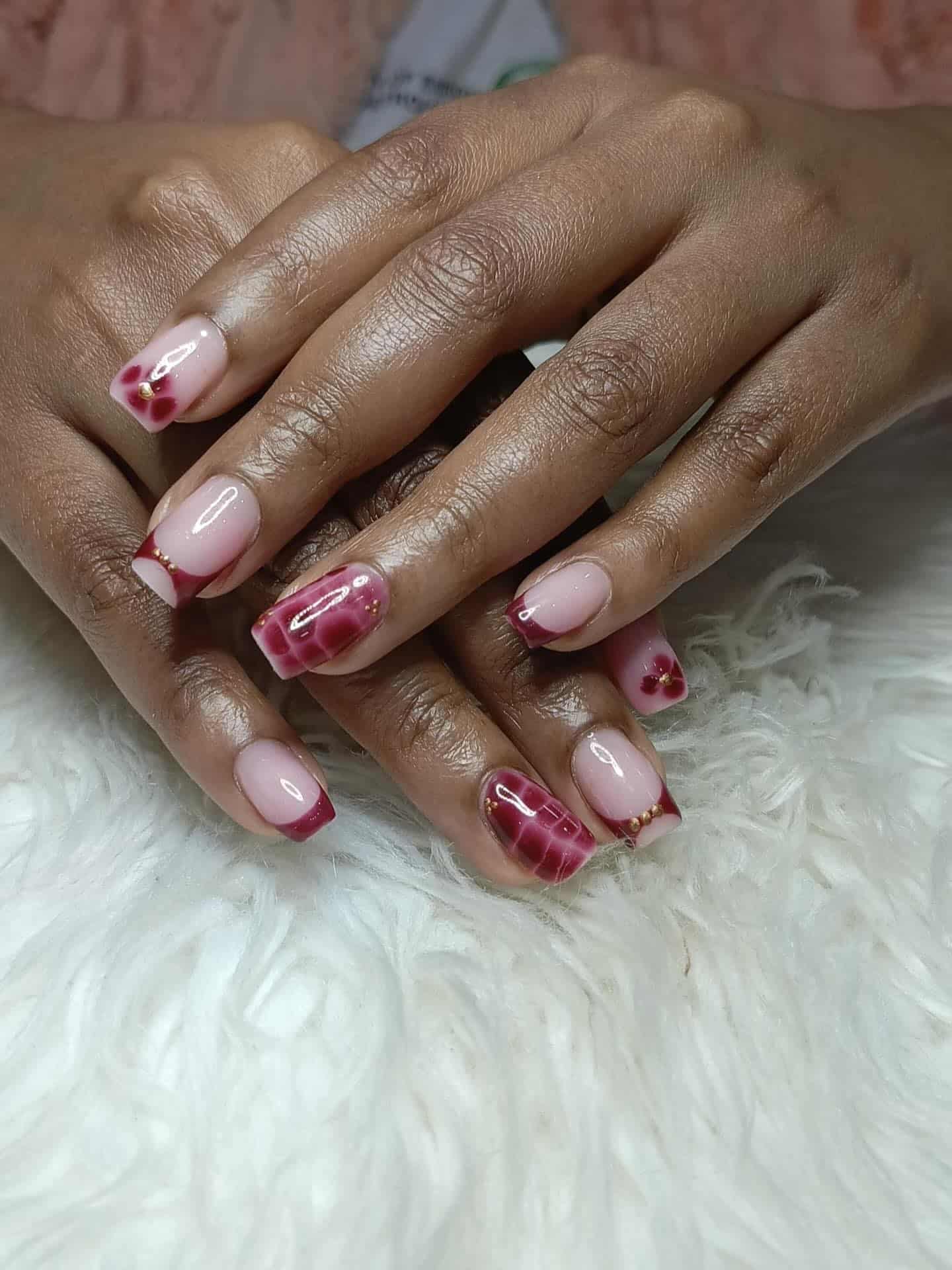 16. Burgundy and Blush Short Square Nails with Gold Stud Accents - nail art ideas