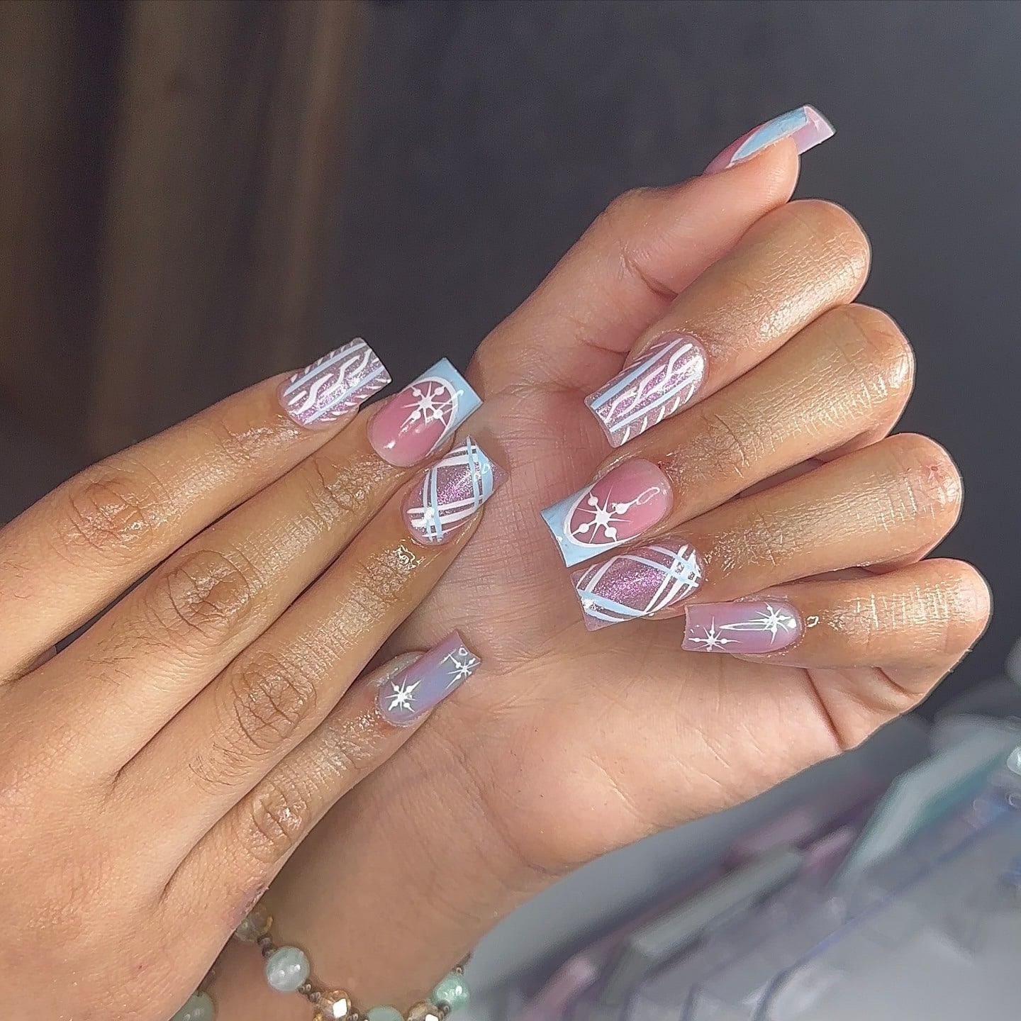 3. Icy Pastel Winter Mix Nails in Lavender, Pink, and Blue - short winter nail ideas