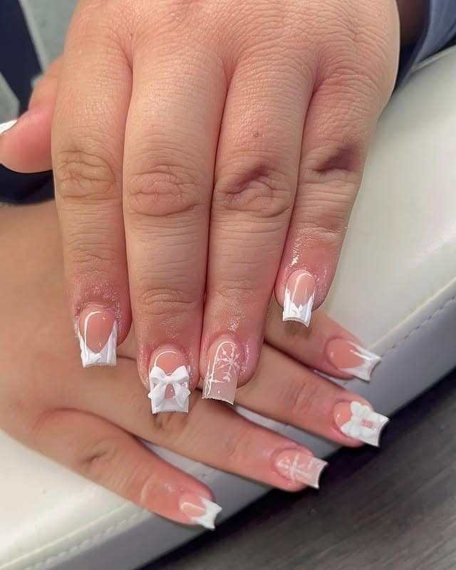 18. Short White Bow French Nails with Delicate Line Art - short winter nail ideas